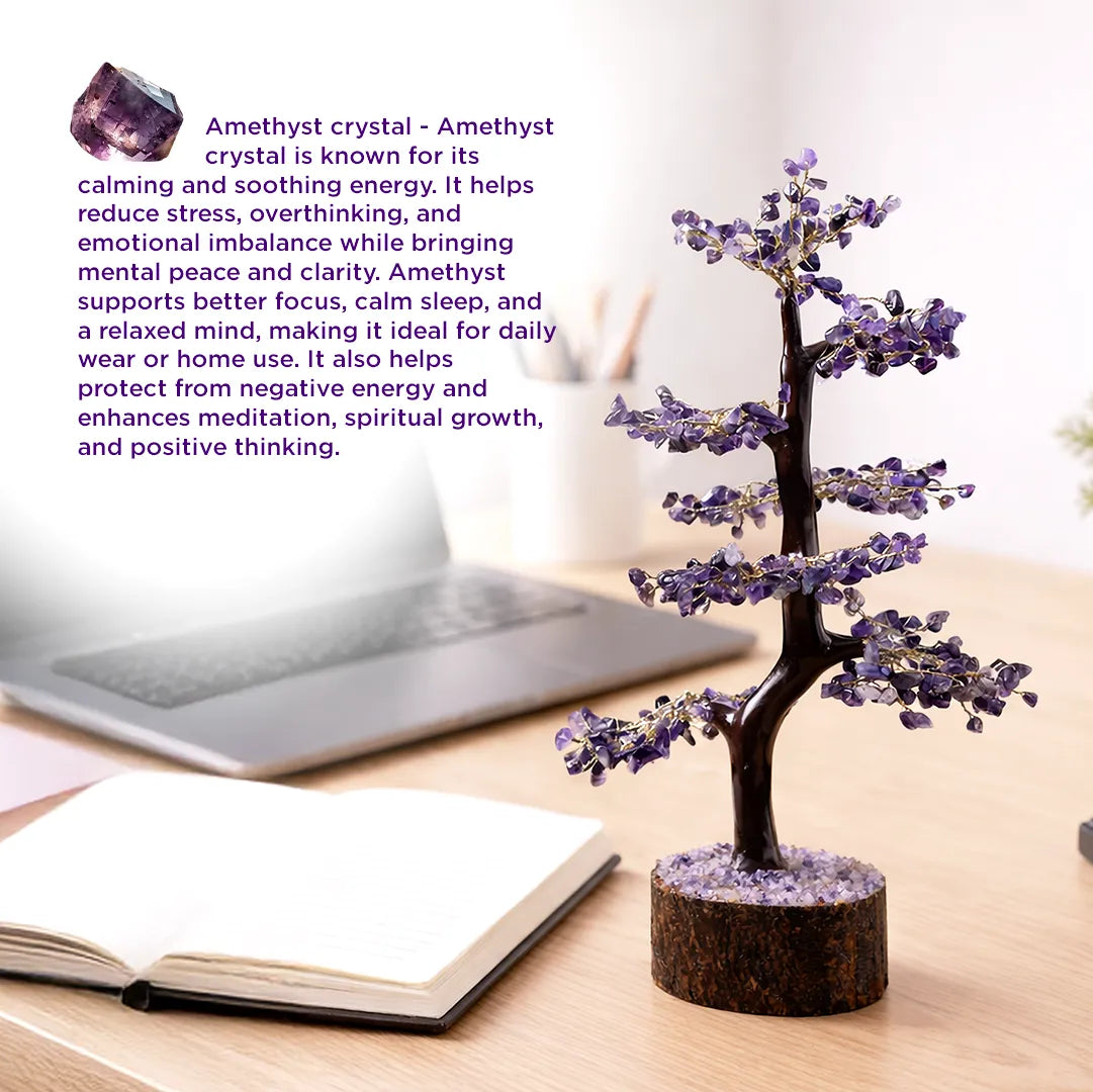 Amethyst crystal tree on a desk with laptop and notebook, text about amethyst properties.Amethsyt Tree : Attract Luck, Enhance Intuition, Improve Health & Skin