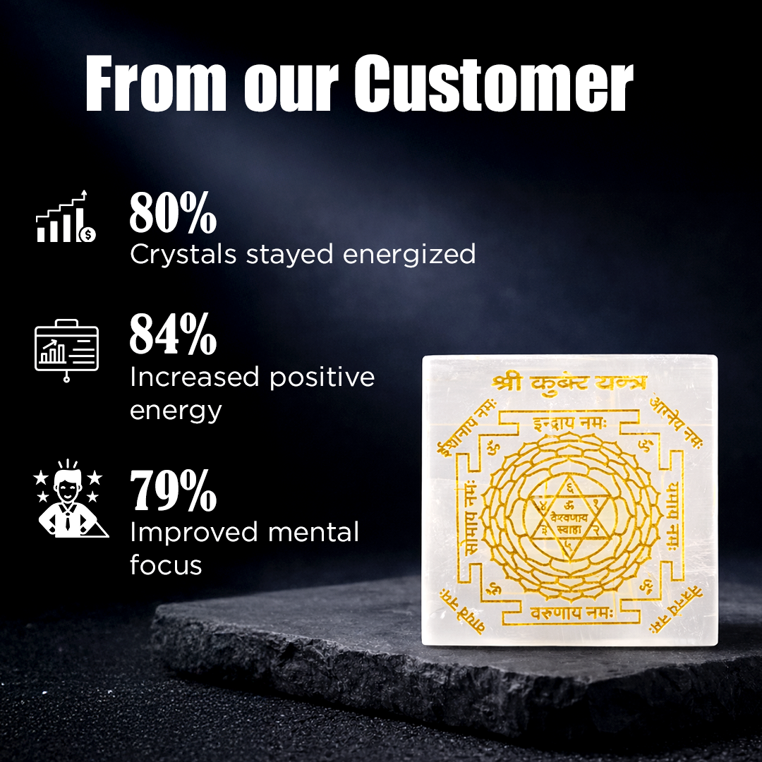 Crystal with gold design on a dark background with customer feedback text.