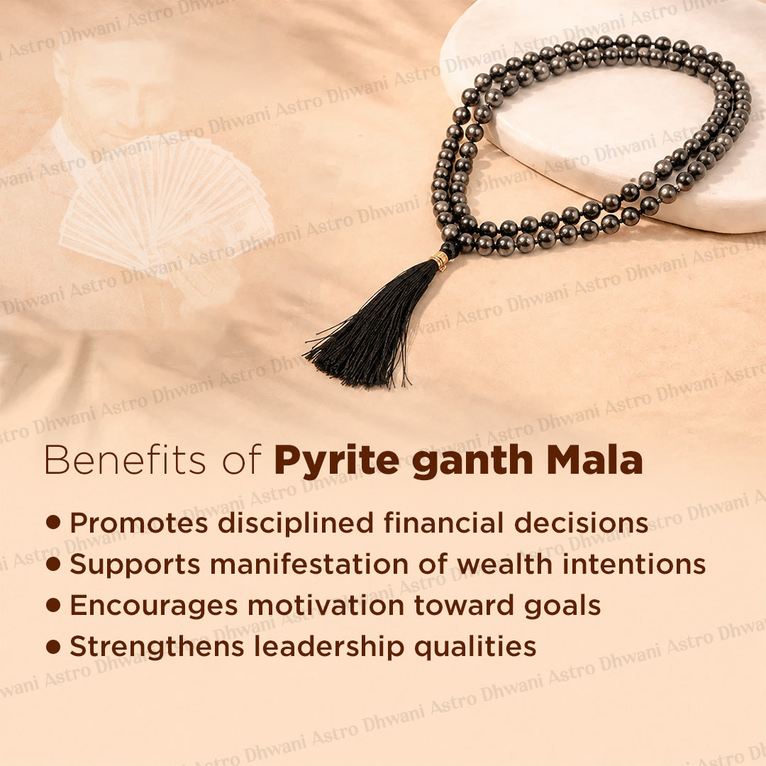 A dark metallic pyrite beaded necklace with a black tassel, styled on a beige textured background with text overlays detailing the benefits of a pyrite ganth mala.