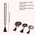Black beaded mala prayer beads shown with length and bead-count specifications on a light background. The image includes a straight laid mala measuring about 25.