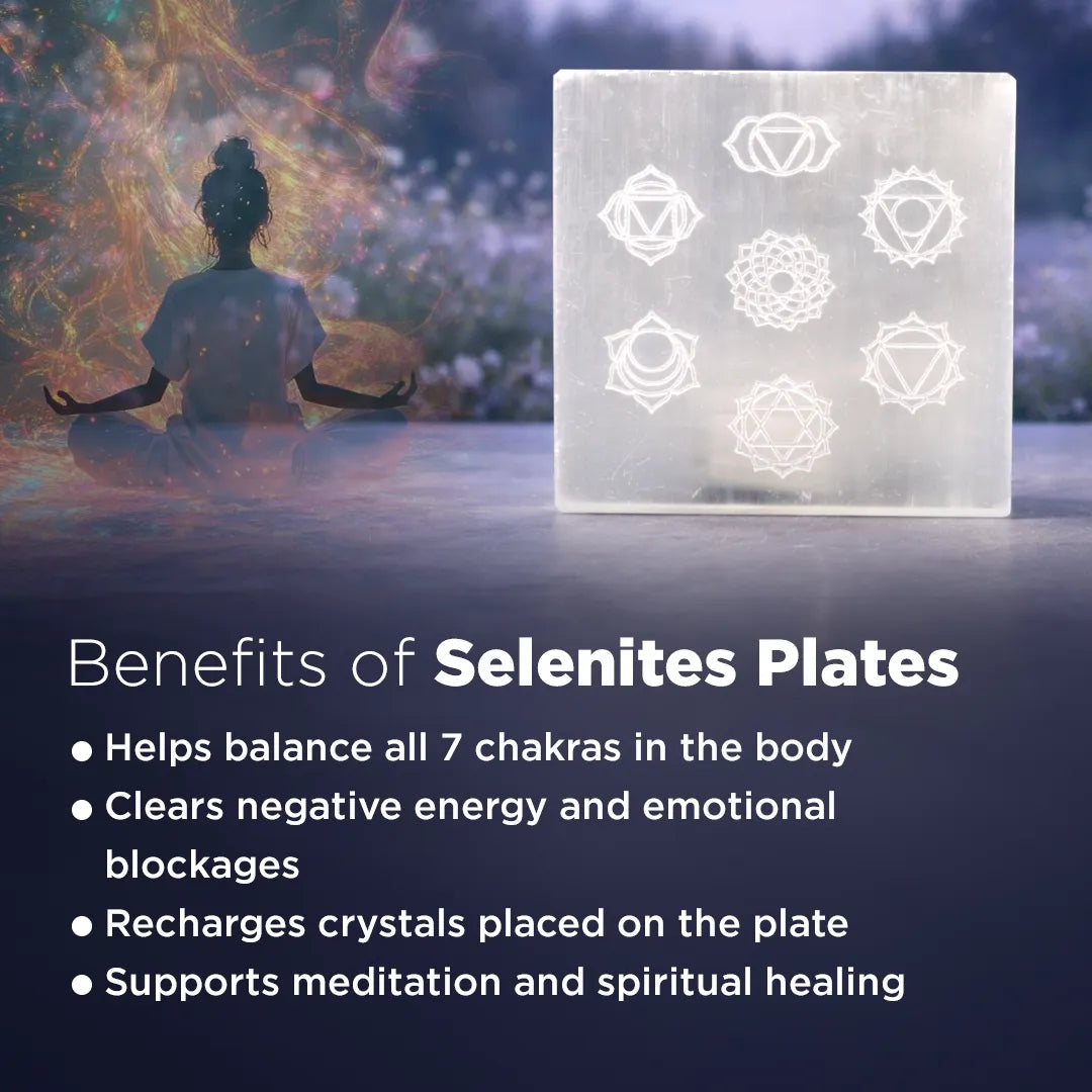 Selenite plate with chakra symbols on a blurred background of a person meditating.