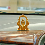 Gold decorative emblem on a car hood