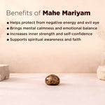 Decorative stone with text listing benefits of Mahe Mariyam on a plain background