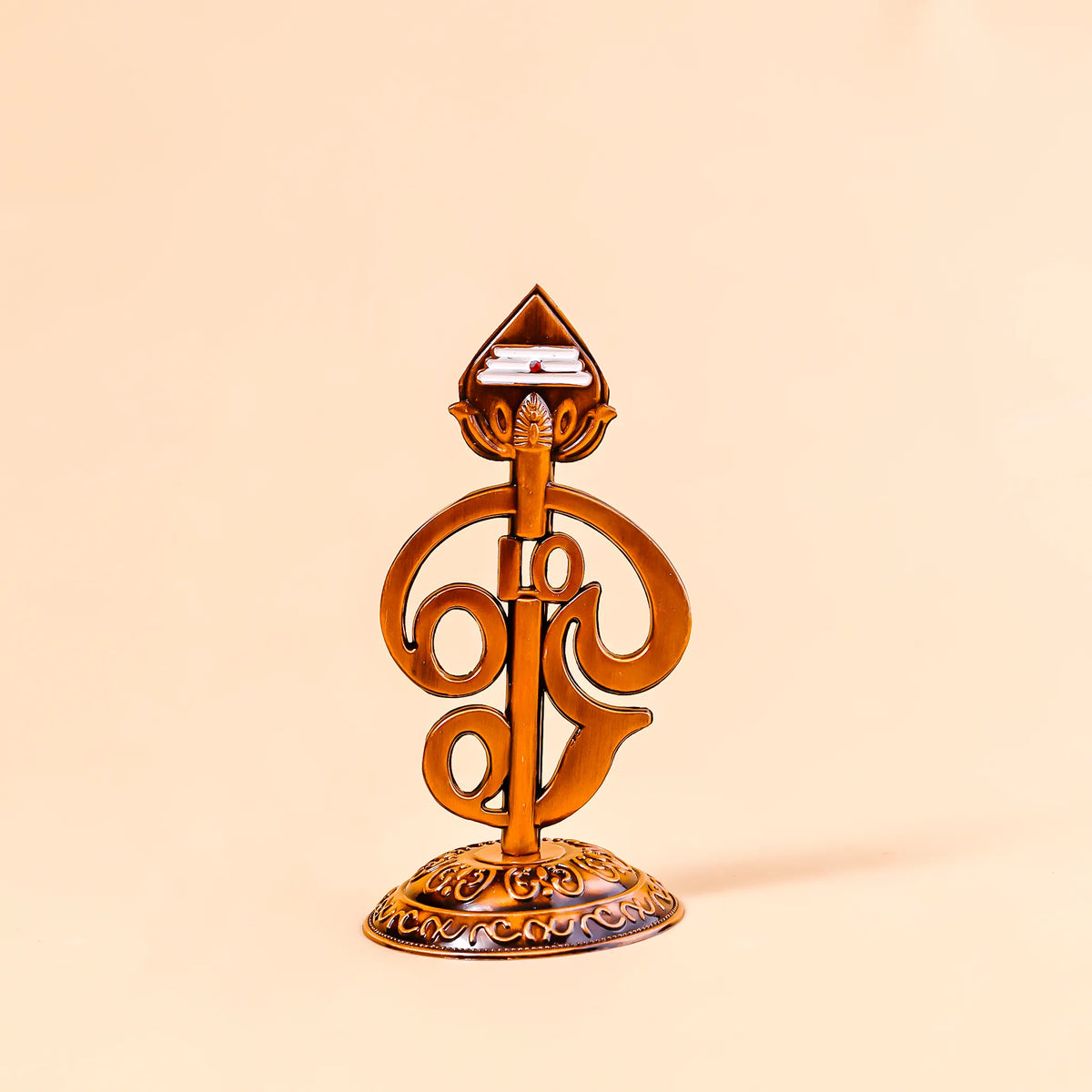 Decorative object with intricate design on a beige background