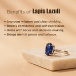 Lapis Lazuli ring on a marble surface with text about its benefits.