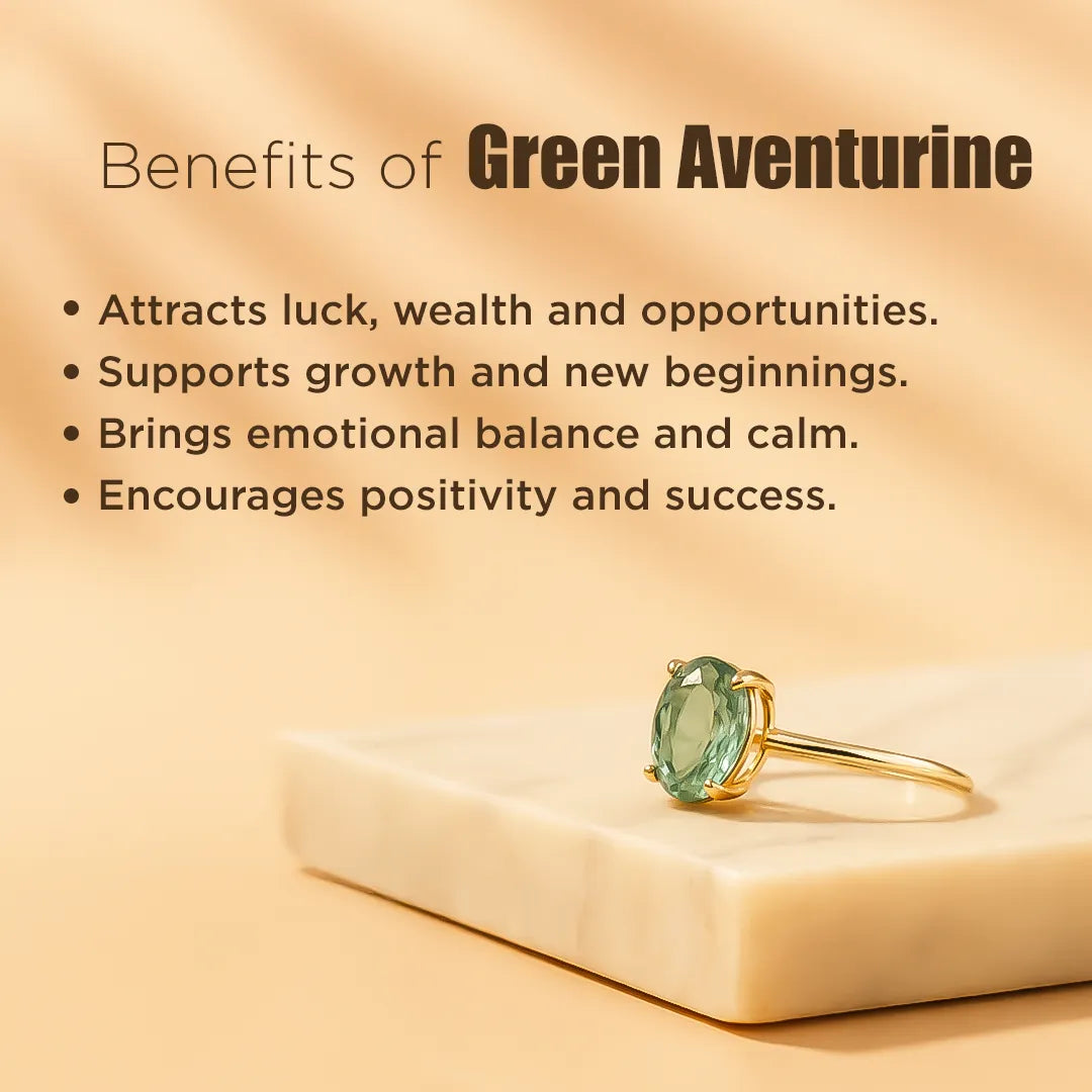Gold ring with green gemstone on a beige background with text about green aventurine benefits.Green Aventurine Ring: Promotes Wealth Attraction & Money Growth
