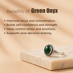 Green onyx ring with text listing benefits on a beige background