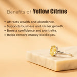 Yellow citrine ring on a beige surface with text listing benefits of yellow citrine.