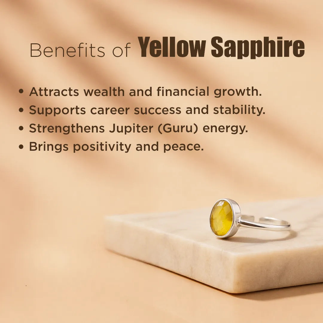 Yellow sapphire ring on a marble base with text about its benefits.