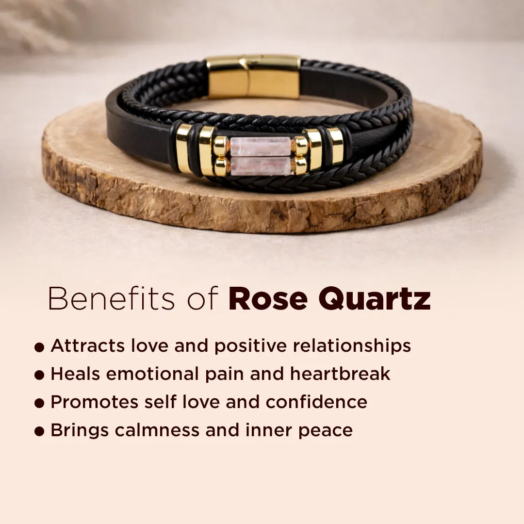 Black and gold braided bracelet on a wooden stand with text about rose quartz benefits.Rose Quartz Leather Bracelet (Relationship & Love)