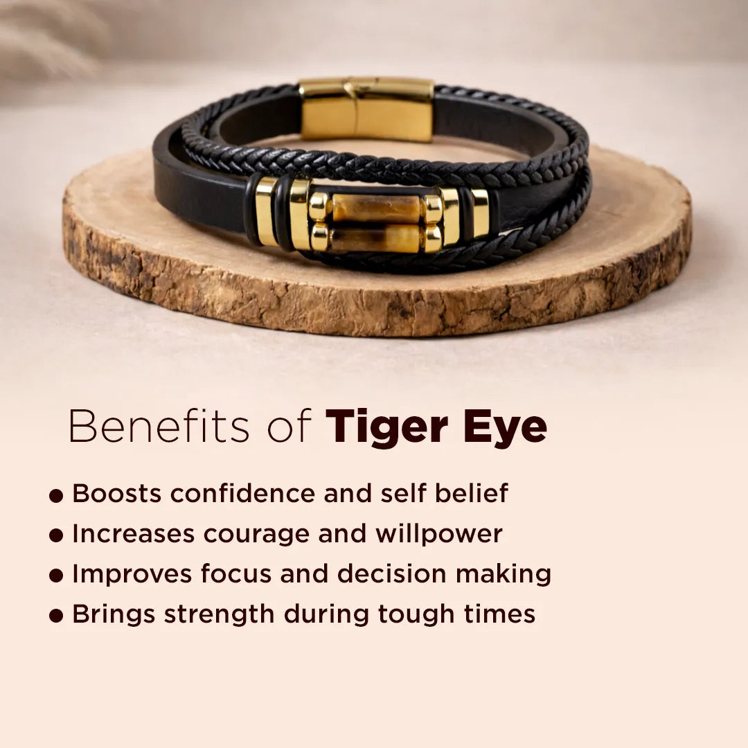 Black and gold braided bracelet on a wooden stand with text about tiger eye benefits.