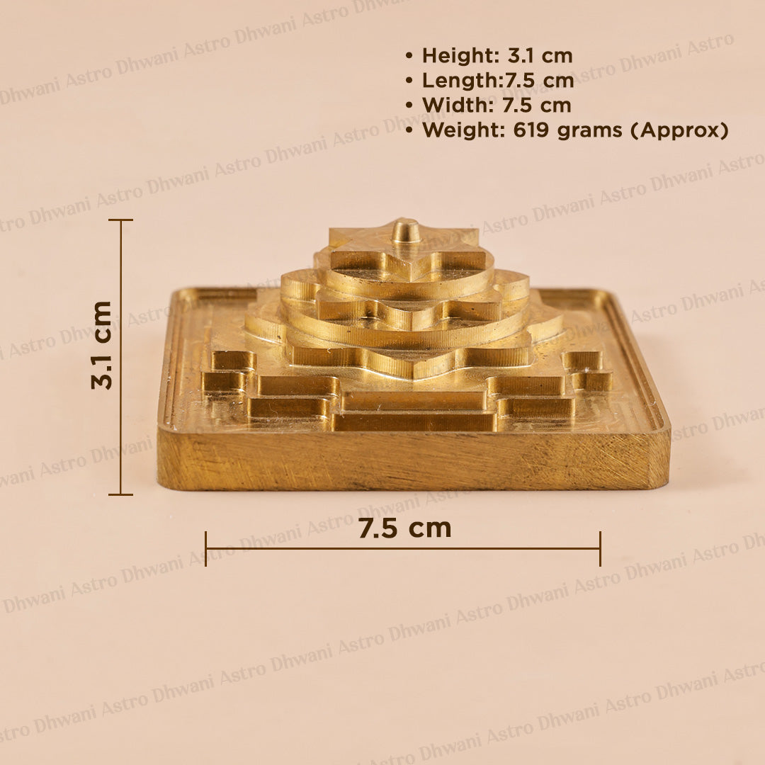 A brass saraswati yantra shown on a beige background with overlaid dimension lines and text listing height, length, width, and weight.