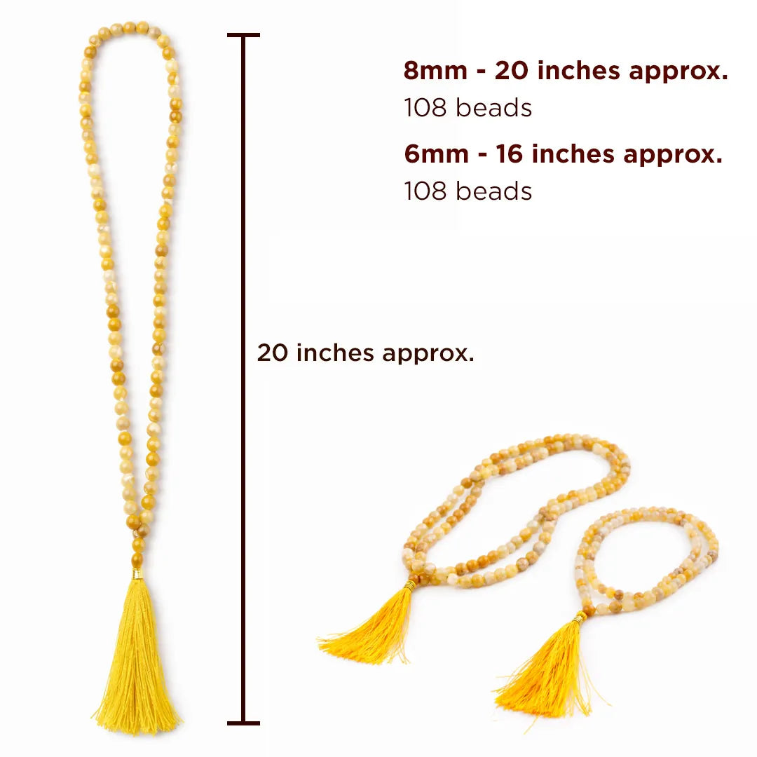 Yellow beaded necklace with tassels and measurements on a white background