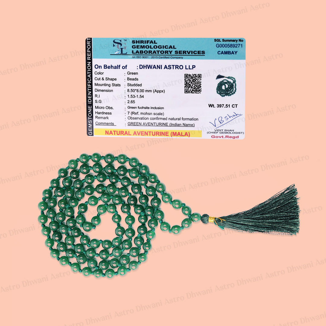 A green aventurine beaded necklace with a tassel, displayed on a peach backgroundएमिथेस्ट जाप माला- अभिमंत्रित और प्रमाणित