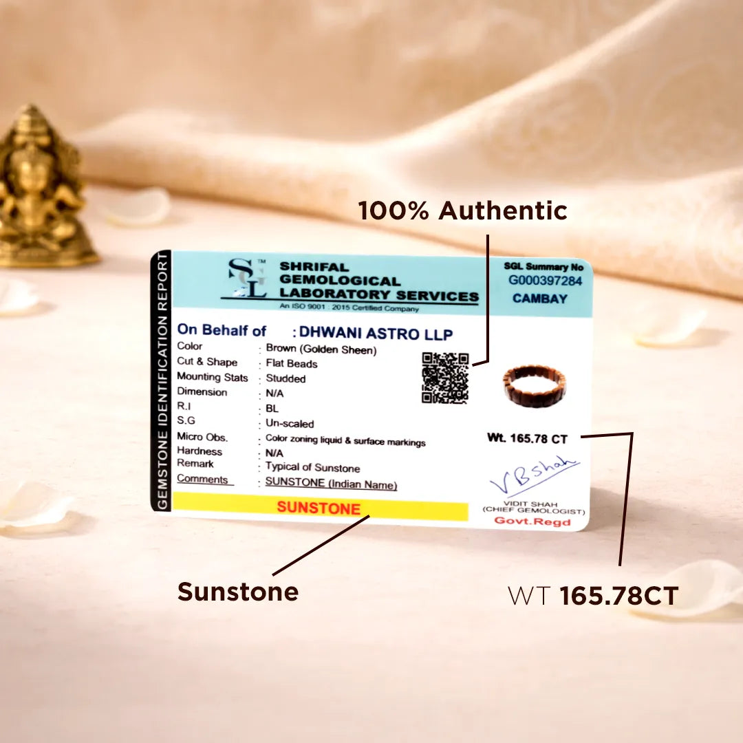 Certification label for sunstone jewelry with Shri Fal Labs details on a soft fabric background.