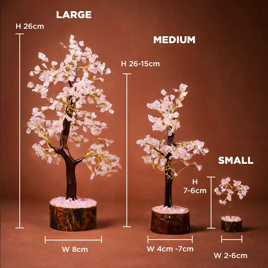 Three sizes of decorative trees with measurements on a brown background