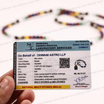 A close-up of a hand holding a printed gemological certificate card in front of a blurred string-of-beads display. The card is labeled 'SHRIFAL GEMOLOGICAL LABORATORY SERVICES' and includes product details such as color, dimensions, hardness, and a QR code, with the beads themselves visible in the out-of-focus background.