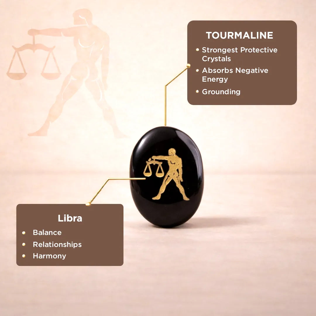 Black tourmaline crystal with Libra zodiac symbol on a beige background