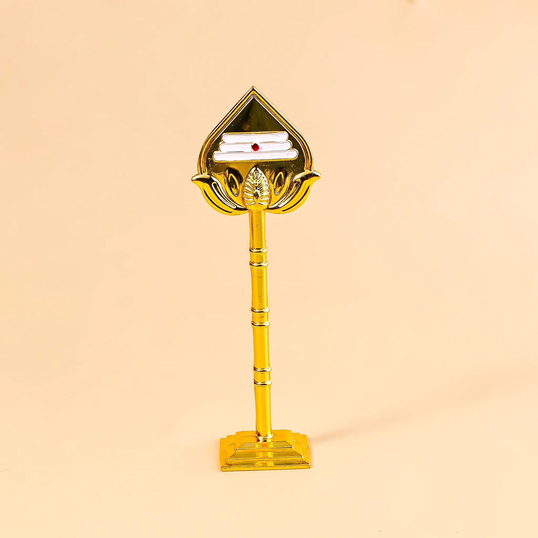 Decorative item with a gold base and a triangular top on a beige backgroundMurugan Vel – Divine Protection & Victory Symbol | Abhimantrit & Certified