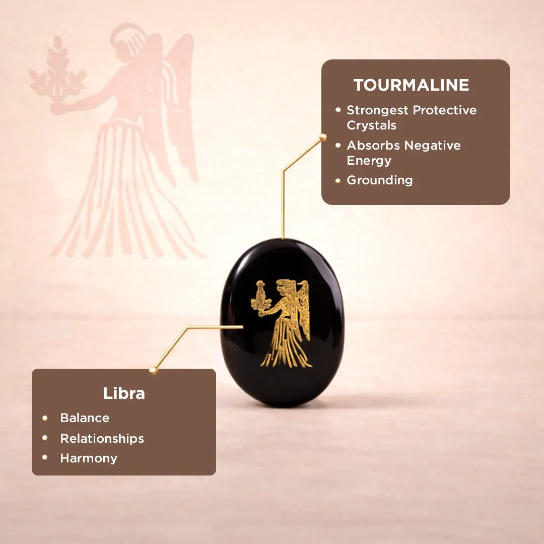 Black tourmaline crystal with angelic design on a pink background, featuring Libra zodiac sign associations.