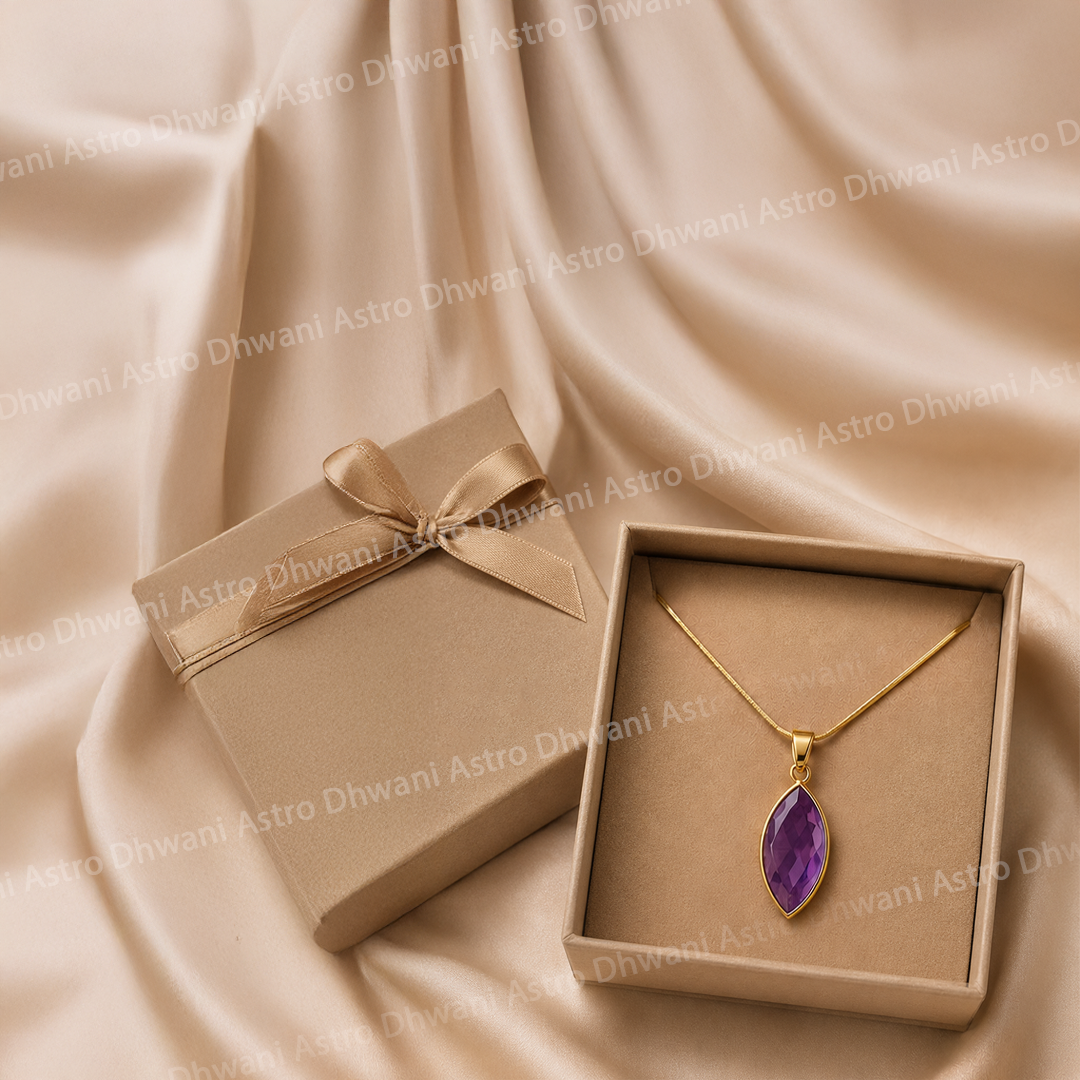 Gold necklace with a purple pendant in an open box on beige fabricNatural Amethyst Aura Pendant in Real 24KT Gold