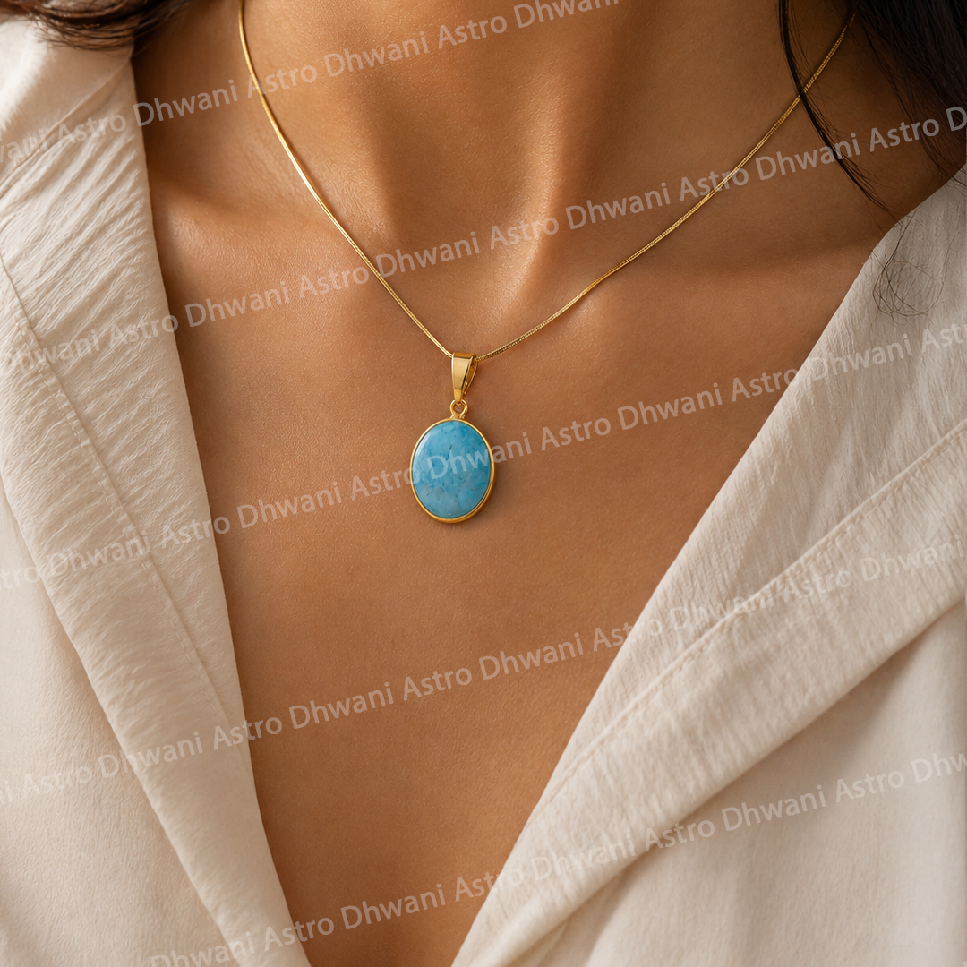 Gold necklace with a blue pendant on a person wearing a white outfit.Turquoise Aura Pendant Oval Shape in Real 24KT Gold Electroformed