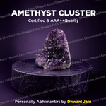 Amethyst cluster on a dark purple stand with branding text.