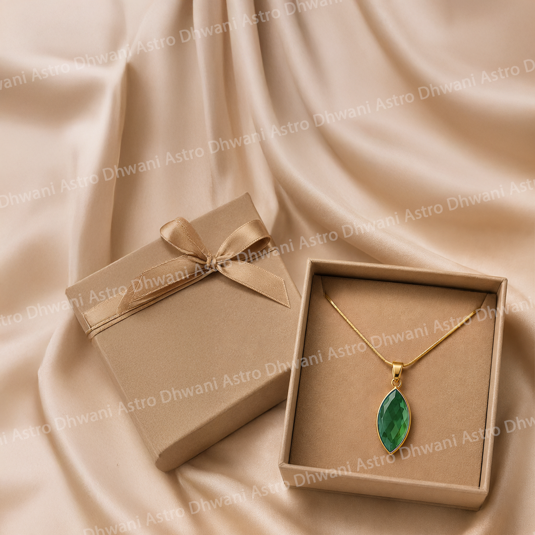 Gold necklace with a green pendant in an open box on beige fabricNatural Green Onyx Aura Pendant in Real 24KT Gold Electroformed