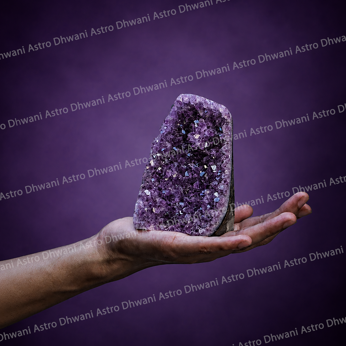 Purple crystal held in a hand against a purple background with 'Astro Dhwani' branding.
