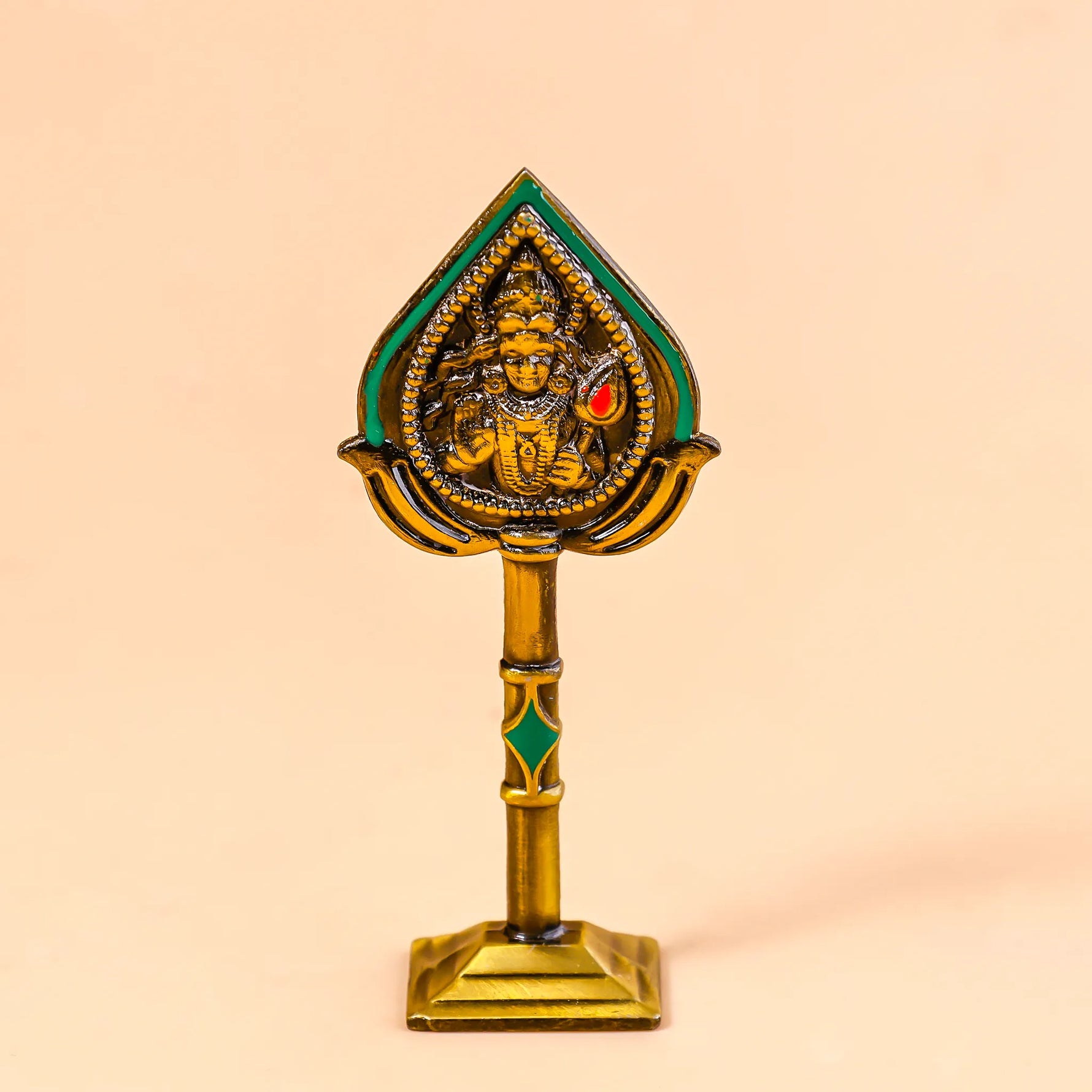 Decorative object with a figure on a stand against a beige backgroundMurugan Face Mina – Divine Blessings & Protection | Abhimantrit & Certified