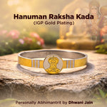 Gold and silver bracelet with Hanuman design on a natural background