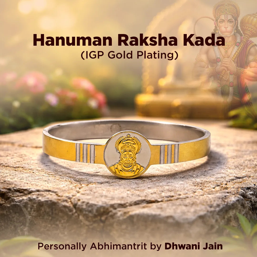 Gold and silver bracelet with Hanuman design on a natural background