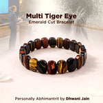 Multi Tiger Eye Emerald Cut Bracelet on a white surface with a blurred background