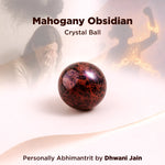 Mahogany Obsidian crystal ball with a blurred background and text about the crystal ball and its creator.