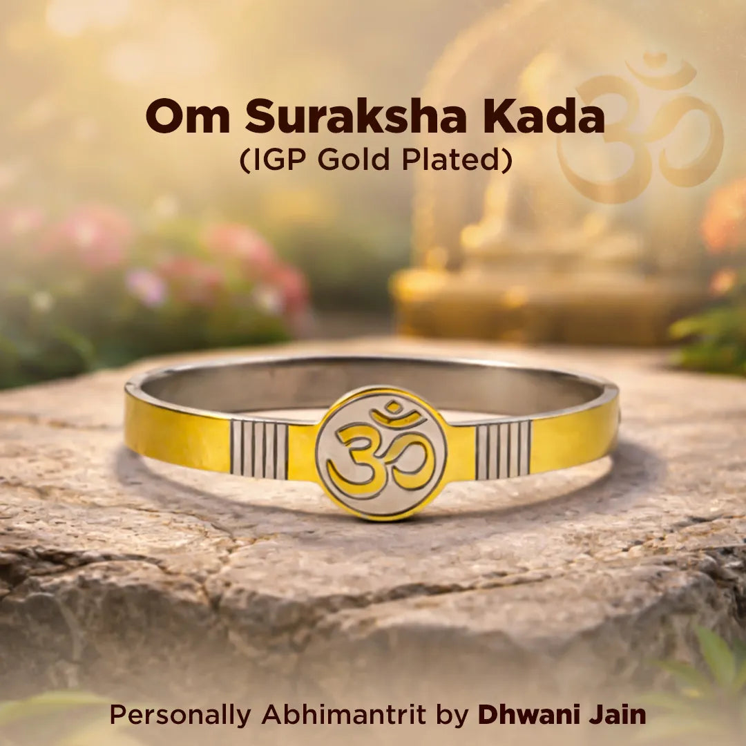 Gold and silver Om symbol bracelet on a natural background with 'Om Suraksha Kada' text.