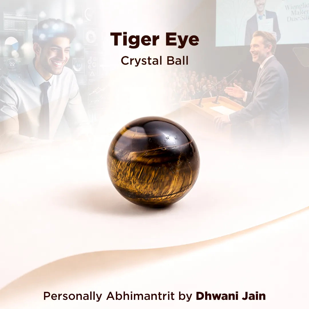 Tiger Eye crystal ball with a blurred background of people in a meeting.
