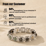 Silver bracelet with gemstones on a textured beige background with customer feedback text.