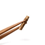 Wooden chopsticks on a white background