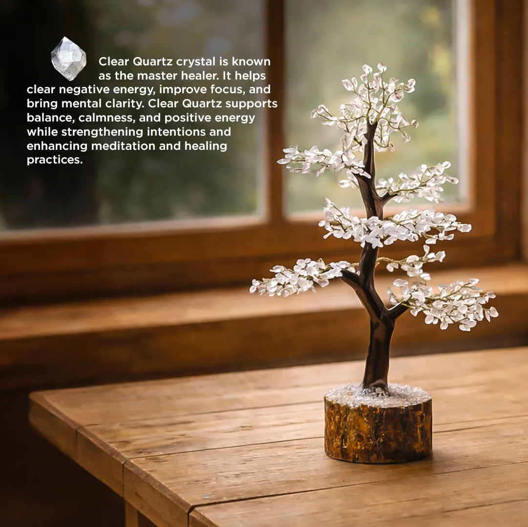 Clear Quartz crystal tree on a wooden table with descriptive text about its properties.