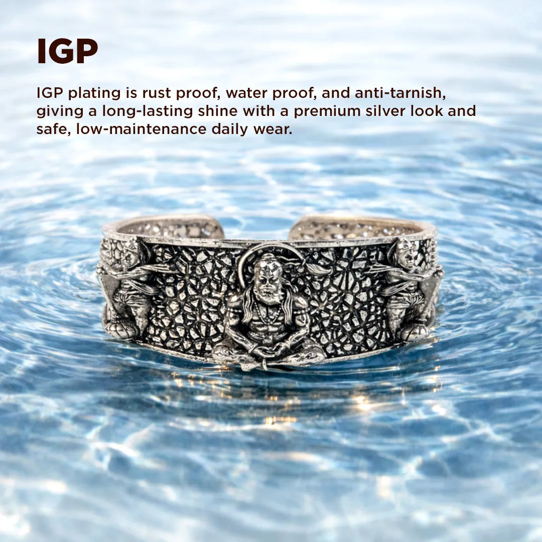 Silver bracelet with intricate design in water, featuring IGP plating text.Hanuman Ji Kada – Silver Oxidized Spiritual Kada for Strength, Protection & Courage