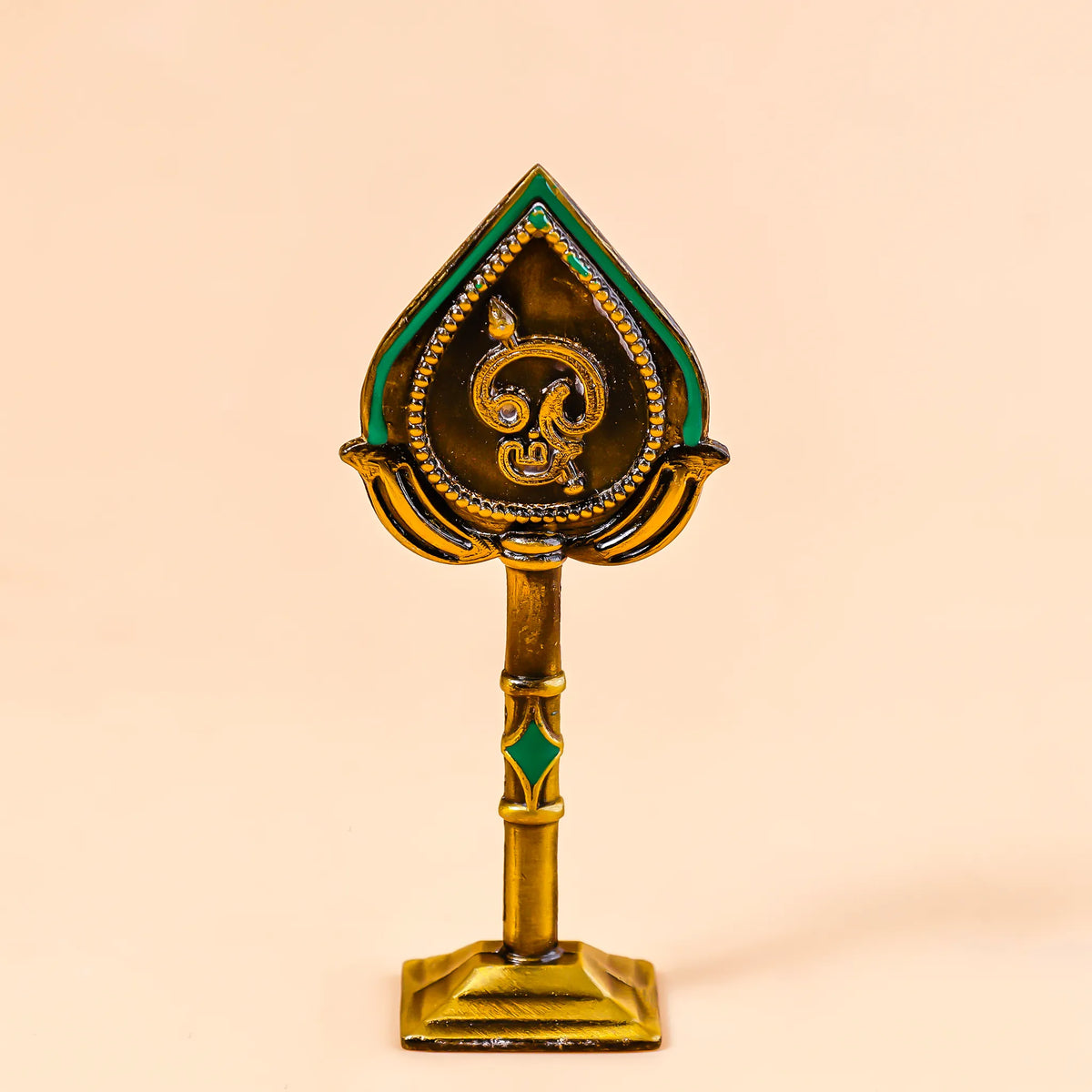 Decorative object with intricate design on a beige background