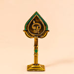 Decorative object with intricate design on a beige background