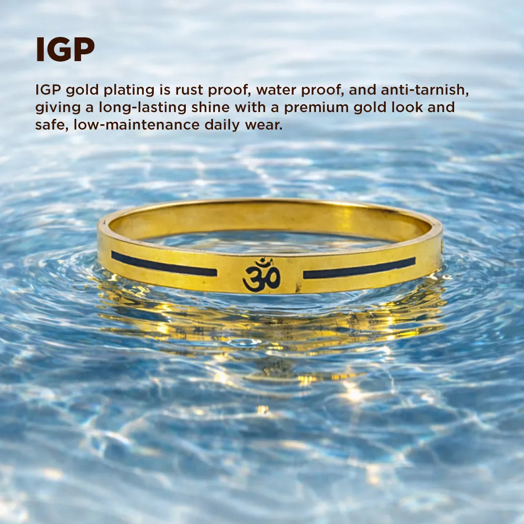 Gold bracelet with Om symbol in water, IGP text above