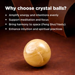 Crystal ball on a dark brown surface with text explaining benefits