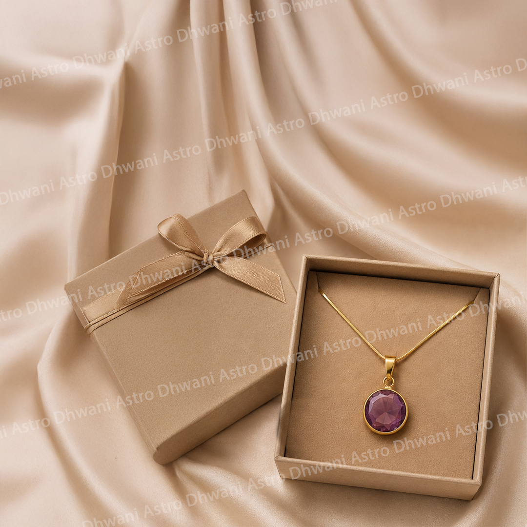 Gold necklace with a purple pendant in a brown box on a beige fabric backgroundRound Amethyst Aura Pendant in Real 24KT Gold with Luxury Crystal