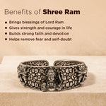 Decorative bracelet with engraved design on a beige background, featuring text about the benefits of Shree Ram.