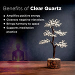 Clear quartz tree with a silhouette of a meditating person against a dark background, featuring text on the benefits of clear quartz.