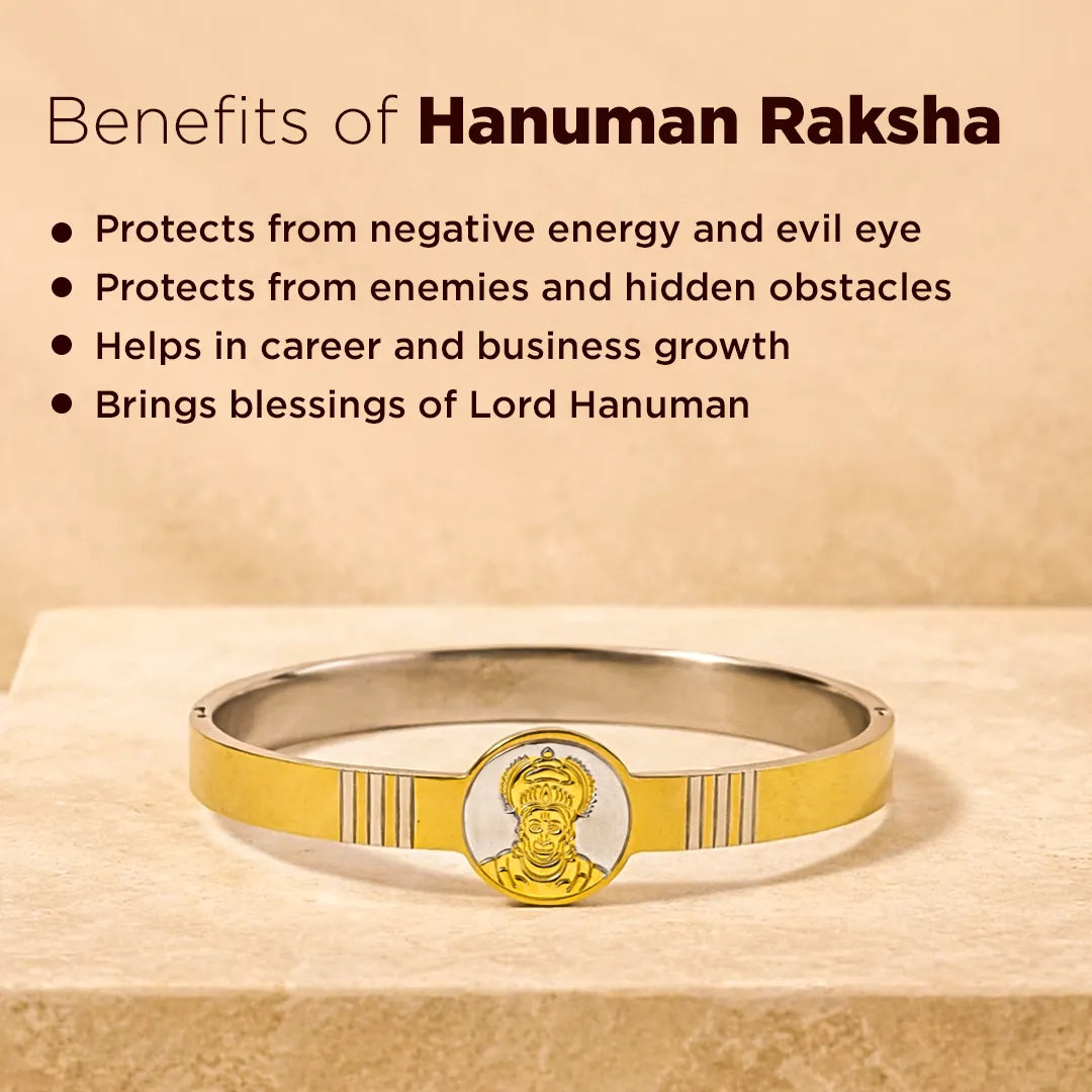 Gold and silver bracelet with Hanuman emblem on a beige background, featuring benefits of Hanuman Raksha.