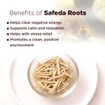 Benefits of Safeda Roots with a bowl of roots and a person meditating in the background