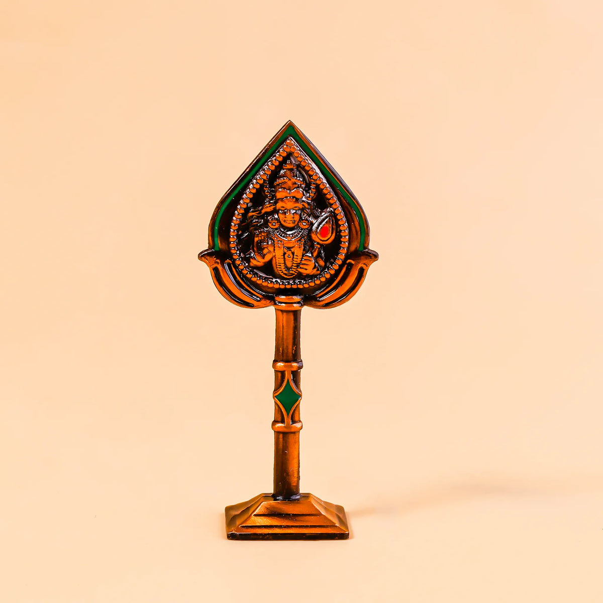 Decorative item with a central figure on a beige background